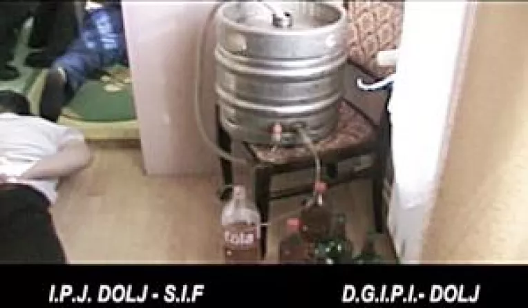 Condamnati pentru ca au falsificat whisky