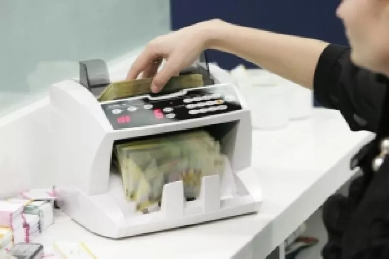 Investitiile straine in Romania au scazut cu aproape 50%