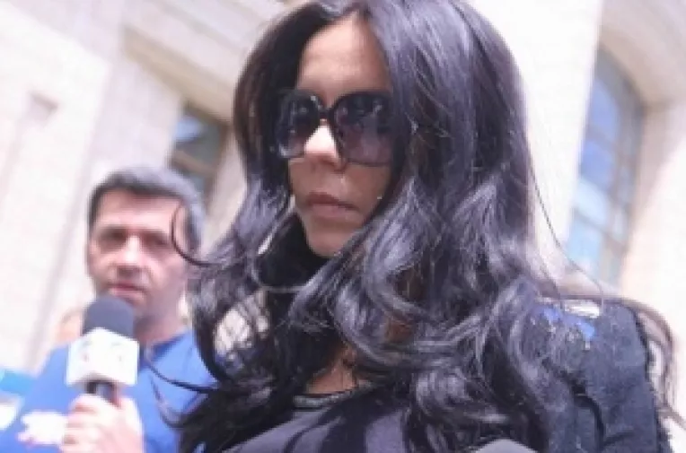 Sotia lui Codrut Marta, arestata pentru prostitutie si proxenetism